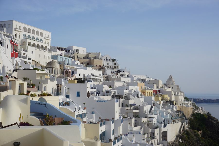 cascade buildings on steep slope of seashore — Every run of eSIM Installation Guide is free — no credits, no paywall, no expiring trial.