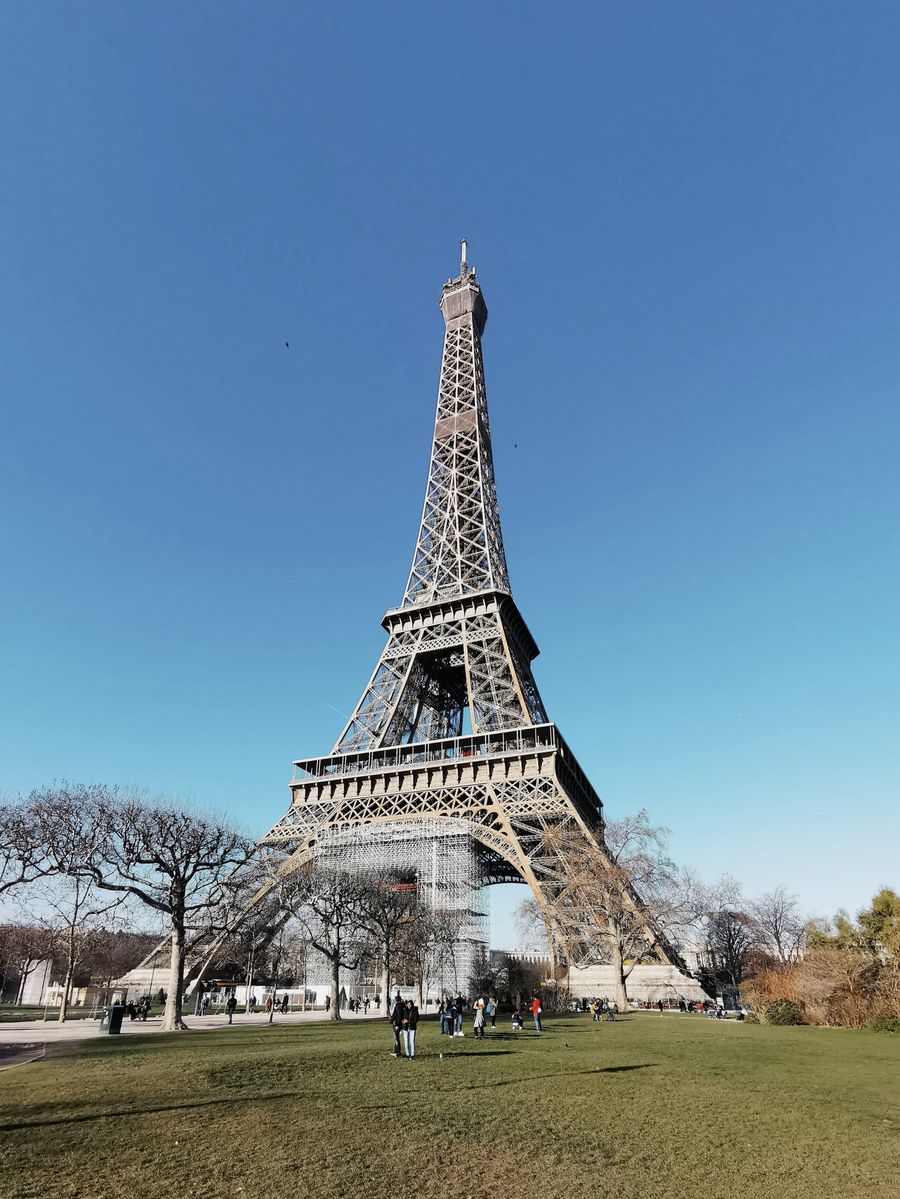eiffel tower under blue sky — Am I Roaming?: the fastest way to turn a vague travel question into a next step.