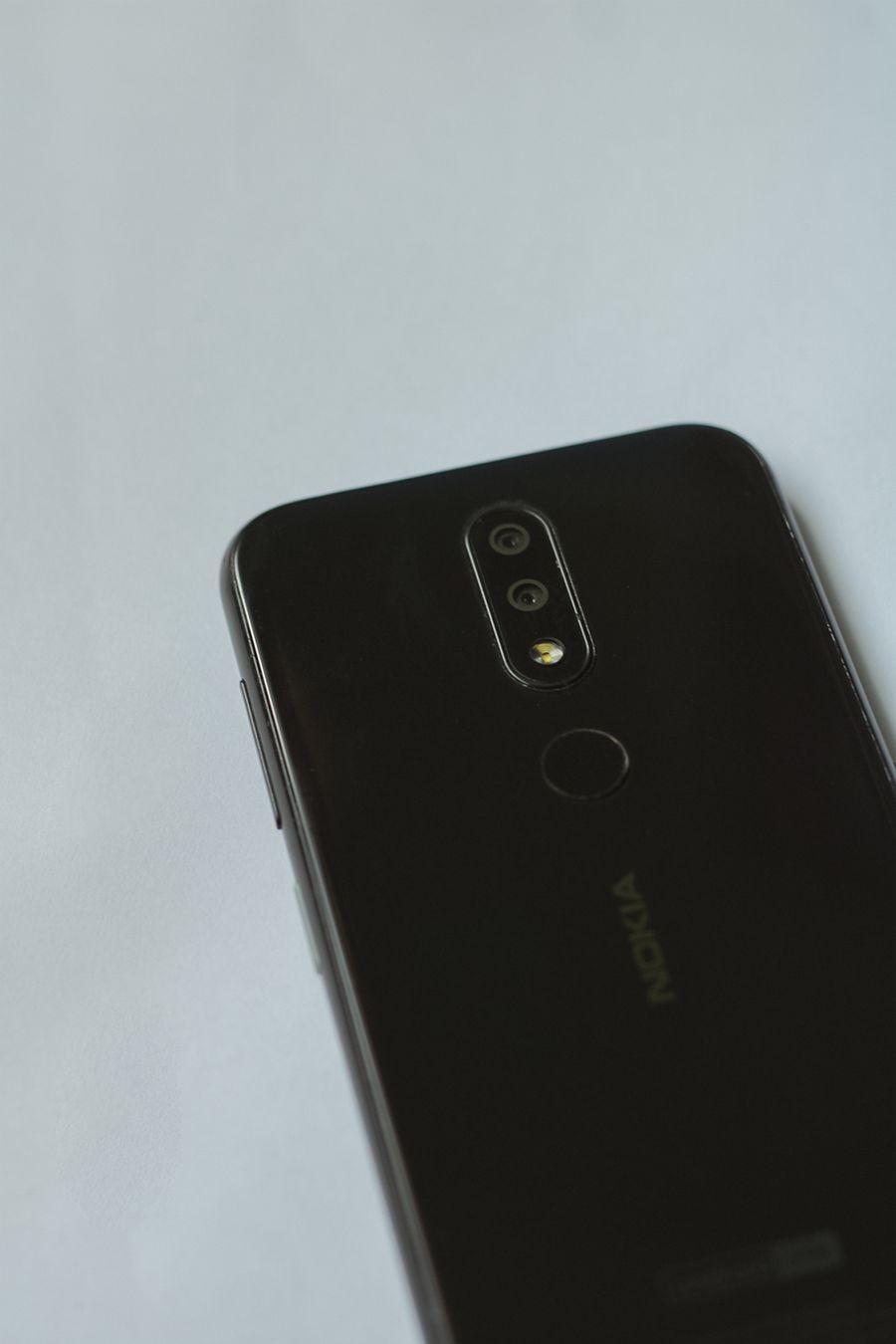 black smartphone in close up photography