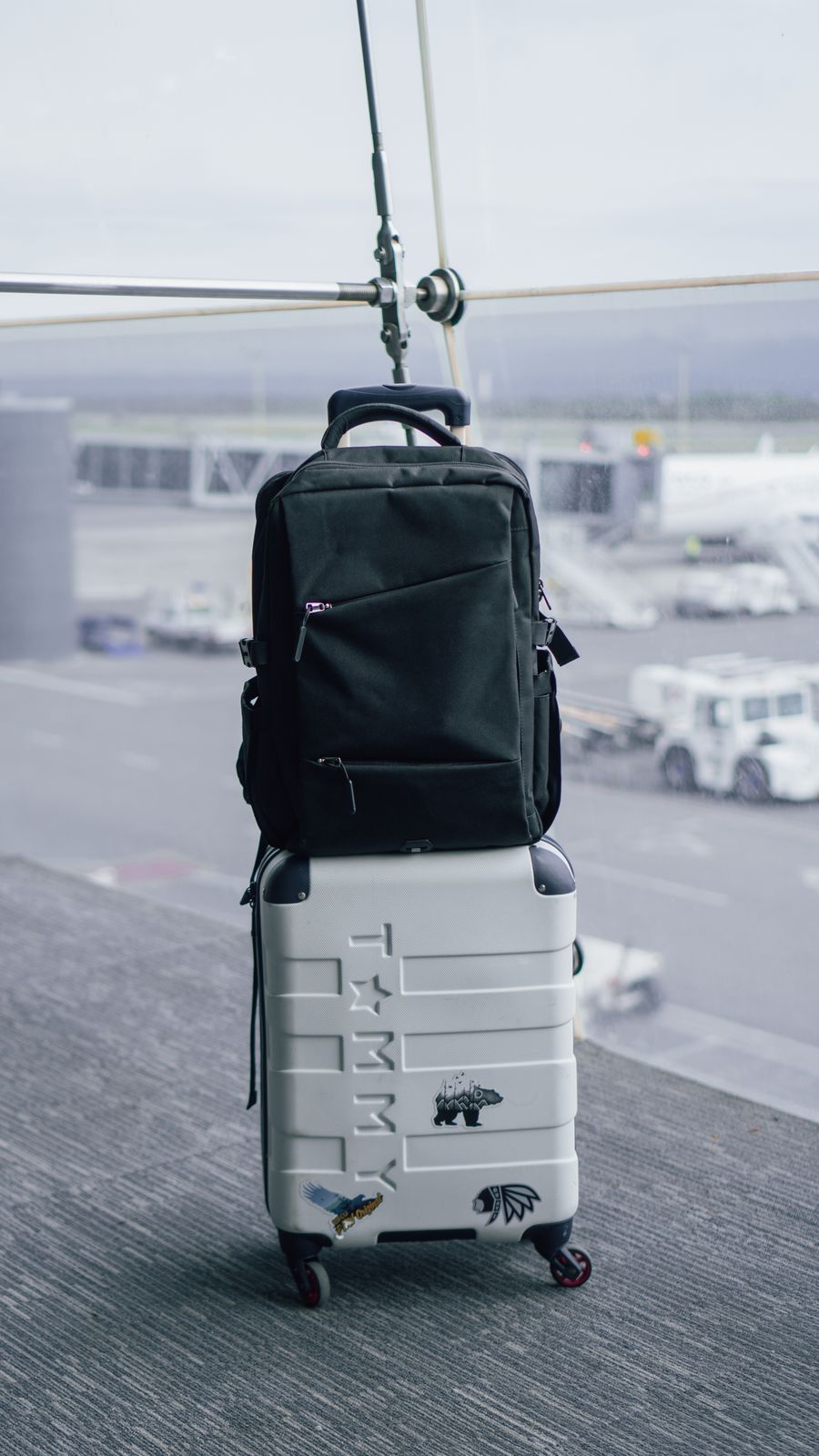 backpack on suitcase on airport — Free Internet Speed Test links every answer onward — usually the plan it recommends.