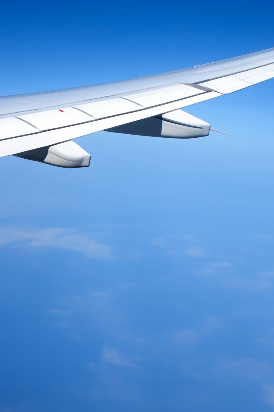 an airplane wing seen from the airplane window — this tool computes the moment you submit — no queues, no waiting room.