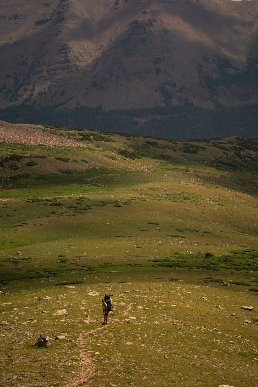 a person walking on a trail in the mountains — Airport Connectivity links every answer onward — usually the plan it recommends.