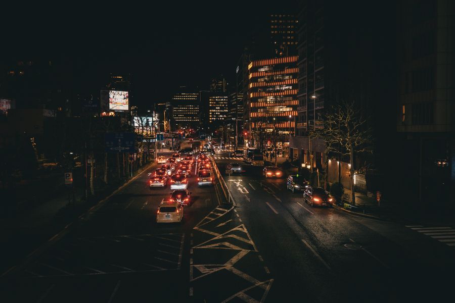 nighttime cityscape of tokyo streets — What’s My IP? accepts your trip details and hands back a clear recommendation.