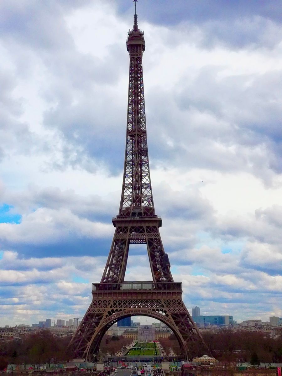eiffel tower in paris against cloudy sky — The welcome home: eSIM deleted in one tap, no contract to cancel.