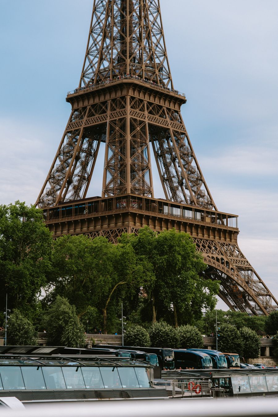 eiffel tower with trees in paris france — Am I Roaming?: the fastest way to turn a vague travel question into a next step.