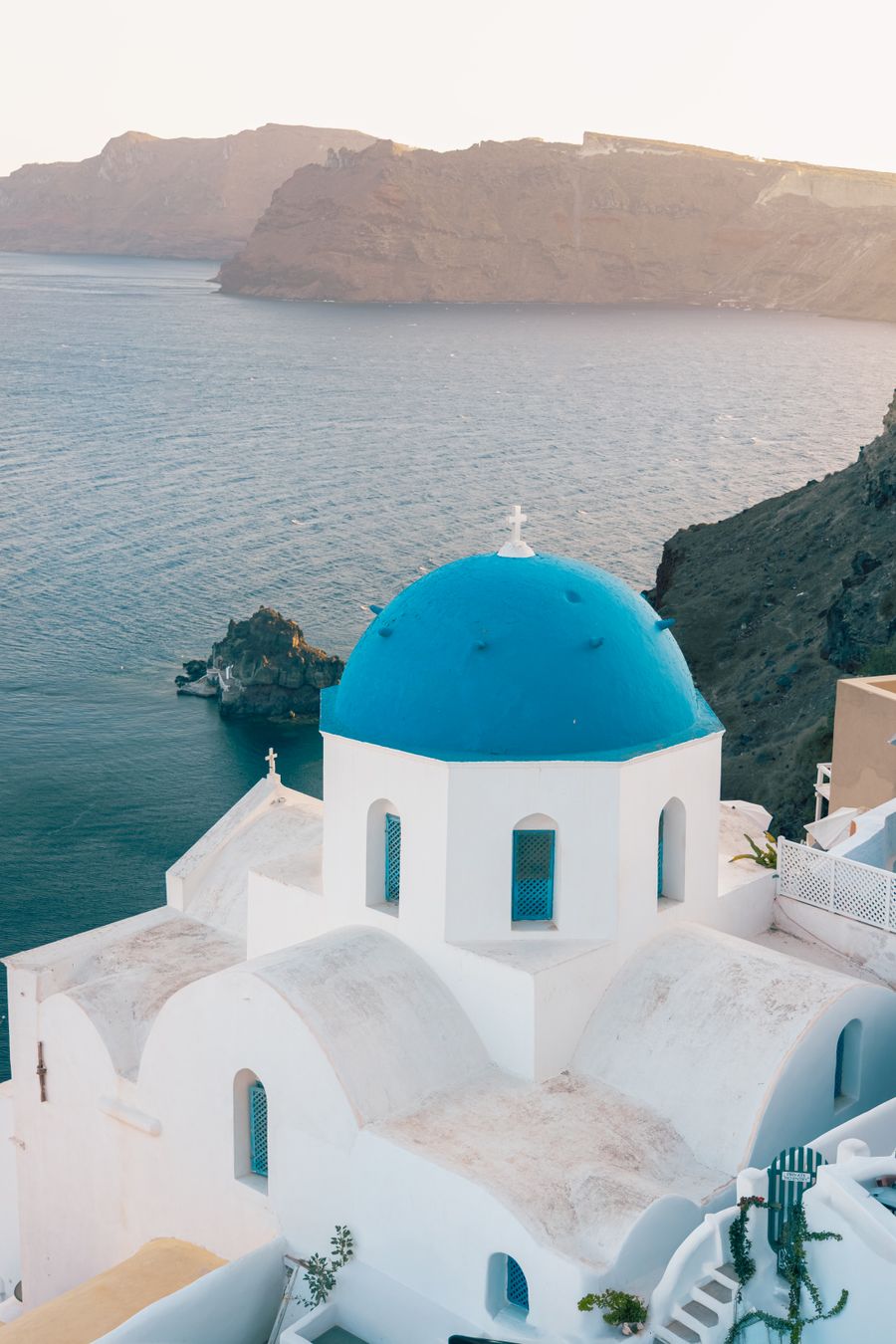iconic blue dome church overlooking santorini coastline — From Free Internet Speed Test's answer to checkout is a short, well-lit path.