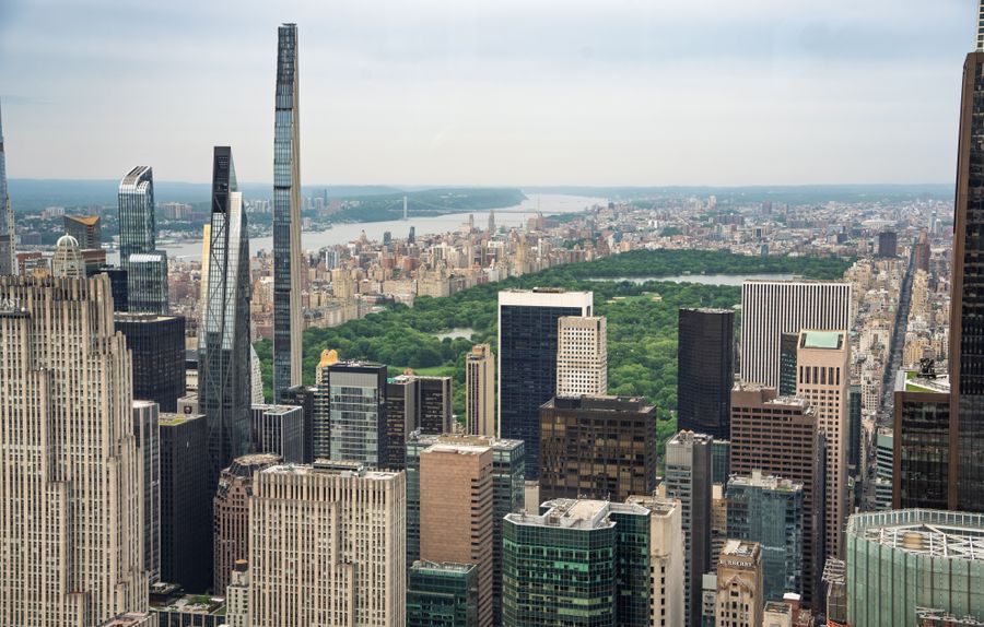 aerial view of midtown manhattan skyscrapers — Coverage Checker works for anonymous visitors — answers first, signup never forced.