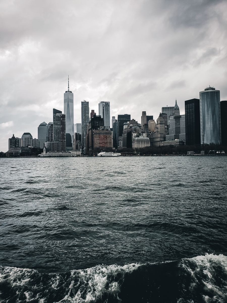 city skyline above dark waving channel — Best Network by City: the fastest way to turn a vague travel question into a next step.