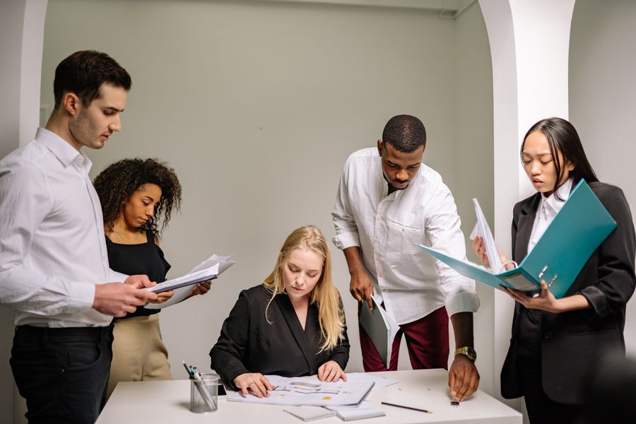 group of people working together — Data Balance accepts your trip details and hands back a clear recommendation.