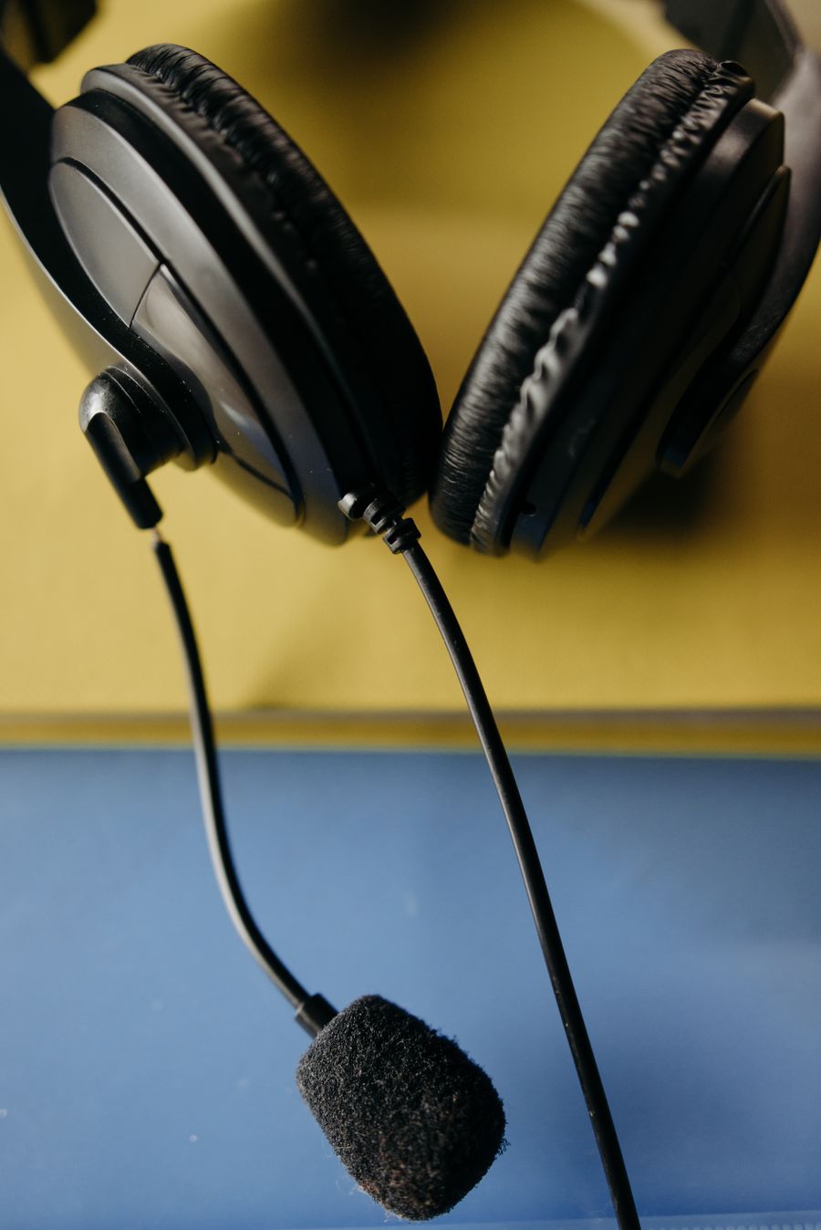 a close up shot of a headset — Real journeys, real connectivity — this is what the product is for.