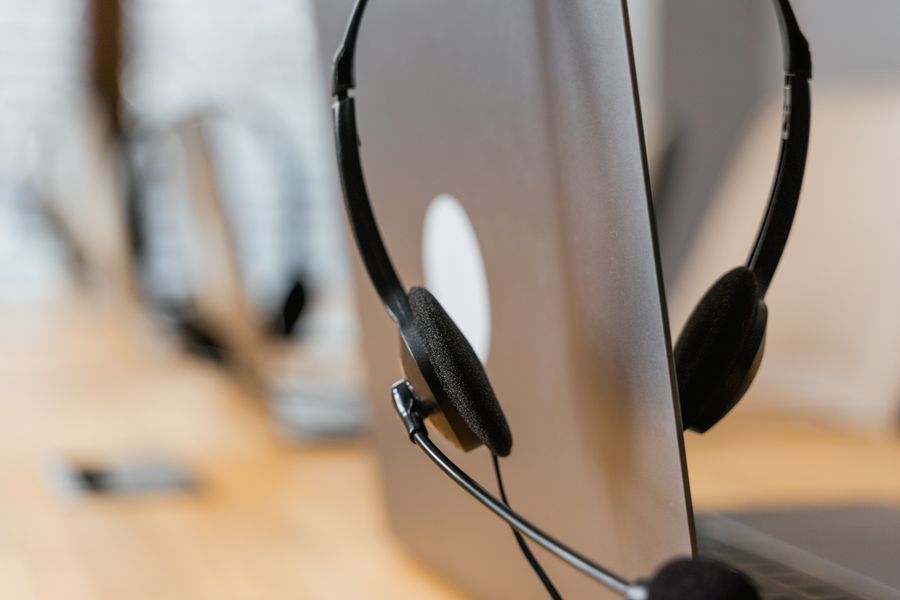 a headset on a laptop — Data-Saver Setup: tell it about the trip, get the answer in under a minute.