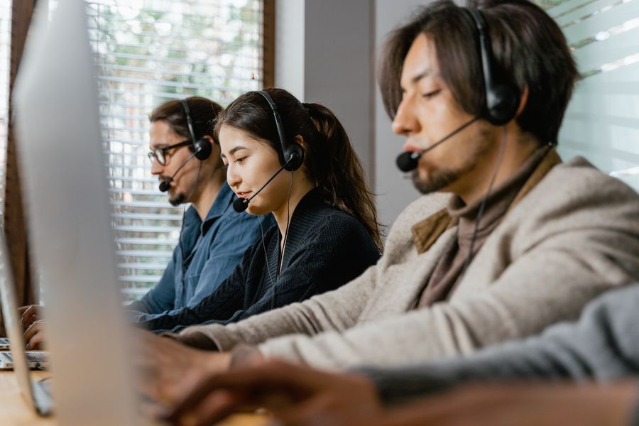 people working as call center agents — Coverage Checker: answers first, never a signup wall.